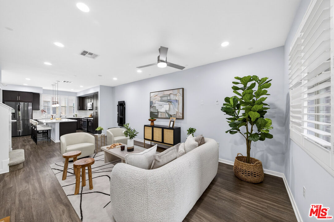 676 Colorado Circle Carson, CA 90745 - Photo 1 of 36 a living room with furniture flowerpot and wooden floor