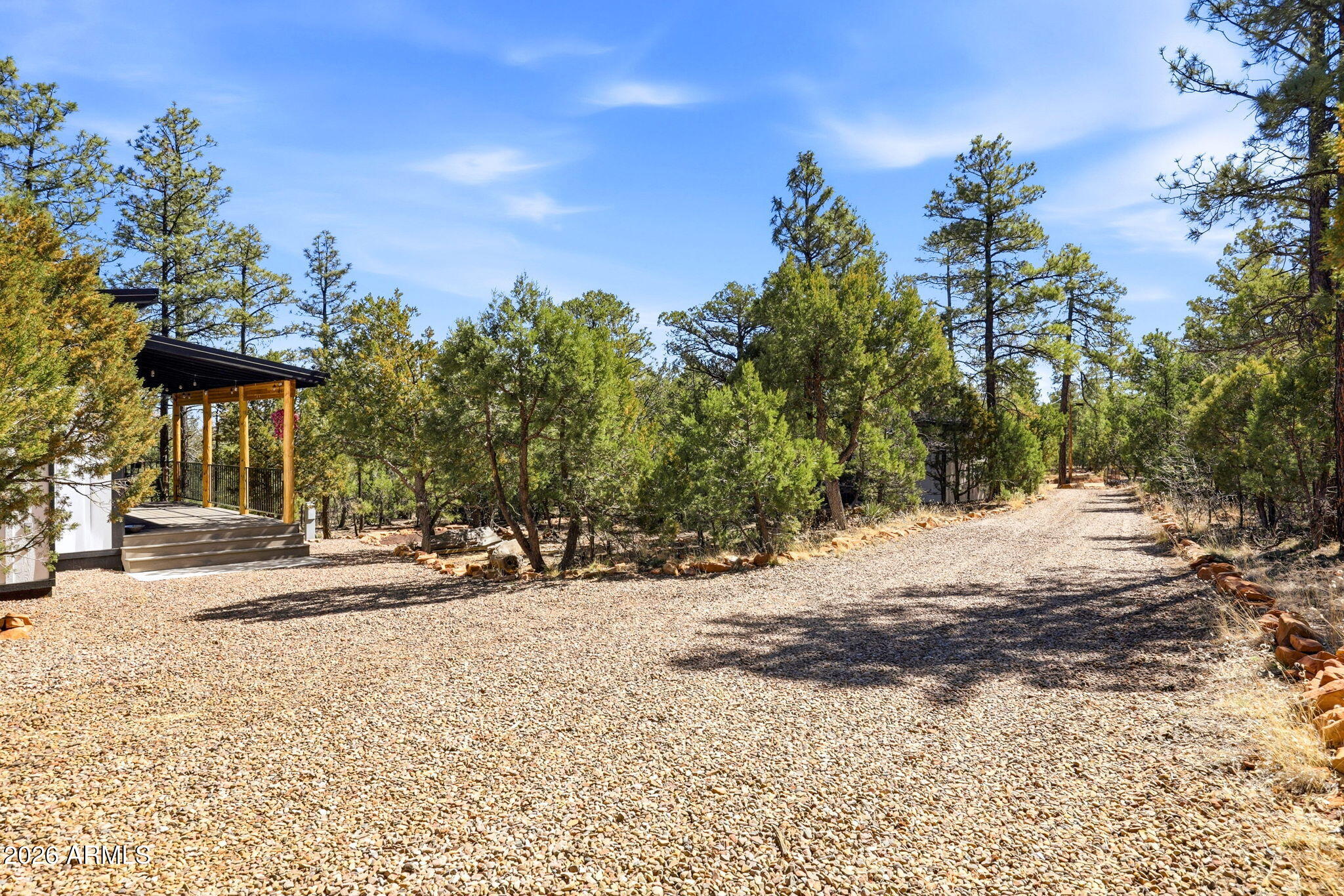 2787 Deer Hill Overgaard, AZ 85933 - Photo 17 of 44 a view of a backyard of a house