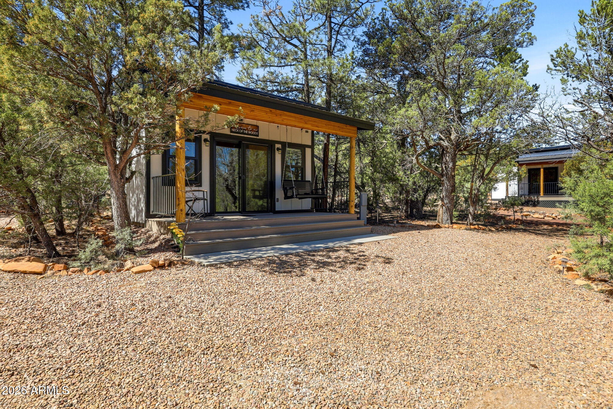 2787 Deer Hill Overgaard, AZ 85933 - Photo 19 of 44 front view of a house with a outdoor space