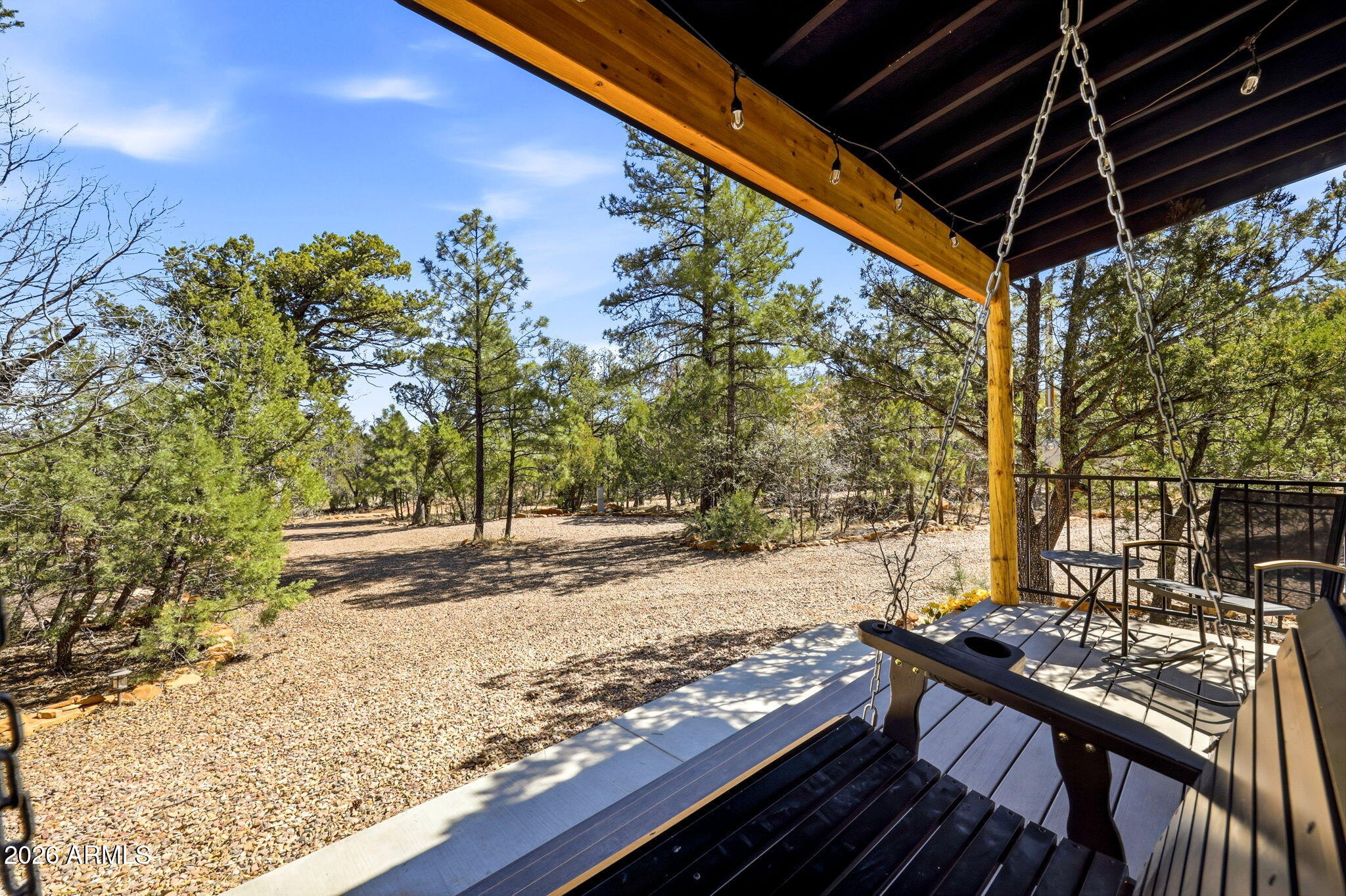 2787 Deer Hill Overgaard, AZ 85933 - Photo 20 of 44 a view of a backyard with wooden floor