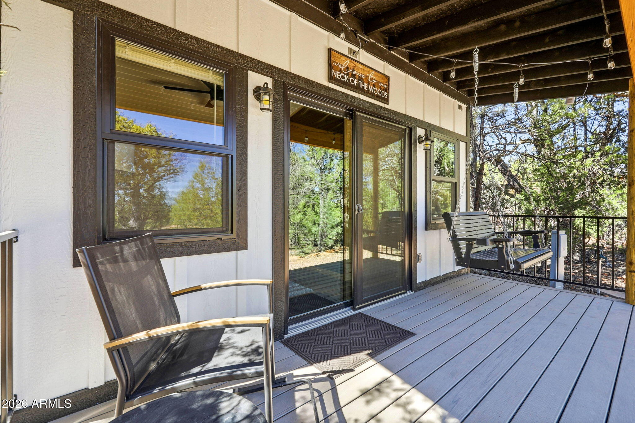 2787 Deer Hill Overgaard, AZ 85933 - Photo 21 of 44 a view of a porch with furniture and wooden floor
