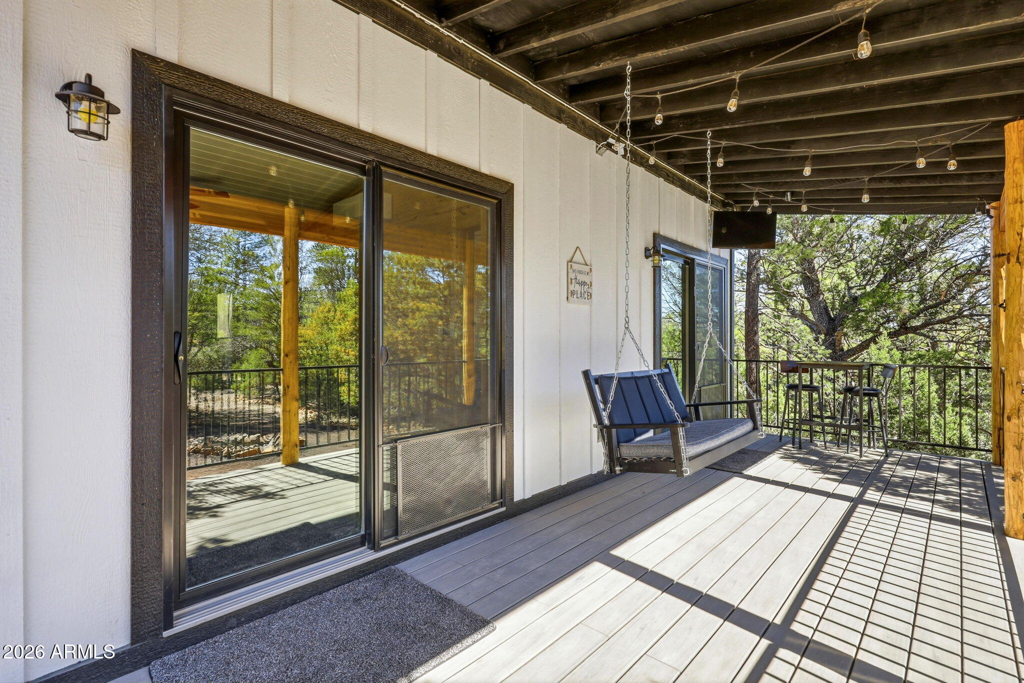 2787 Deer Hill Overgaard, AZ 85933 - Photo 5 of 44 a view of a two chairs in the balcony