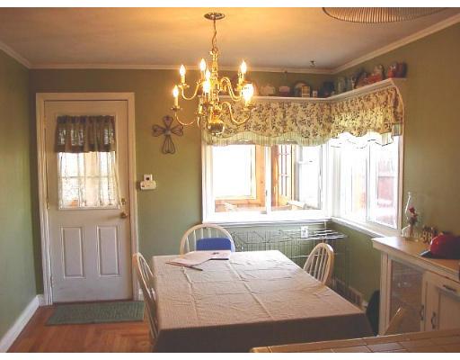 1418 Worcester Street Springfield, MA 01151 - Photo 2 of 8 a living room with furniture and a chandelier