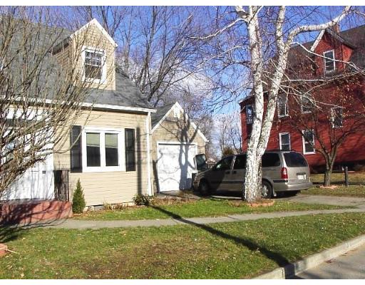 1418 Worcester Street Springfield, MA 01151 - Photo 7 of 8 front view of house with a yard
