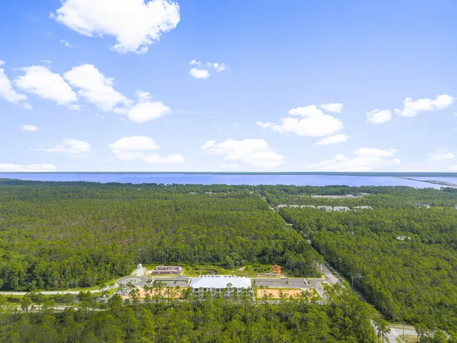 a view of a lake with a big yard