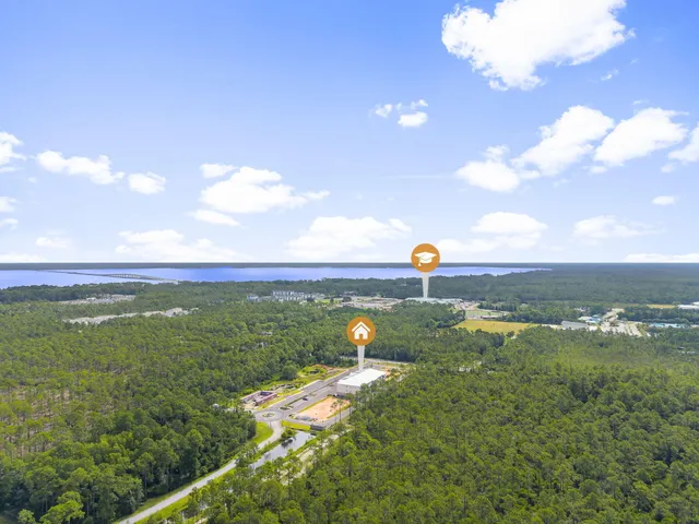 a view of a lake with a yard