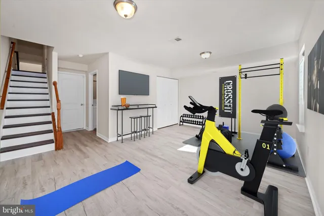 a view of a room with gym equipment