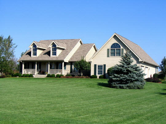 4042 West Midtown Road Mount Morris, IL 61054 - Photo 1 of 7 a front view of a house with a garden