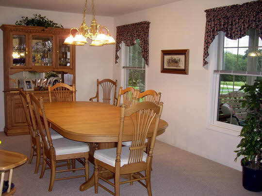 4042 West Midtown Road Mount Morris, IL 61054 - Photo 4 of 7 a view of a dining room with furniture and window