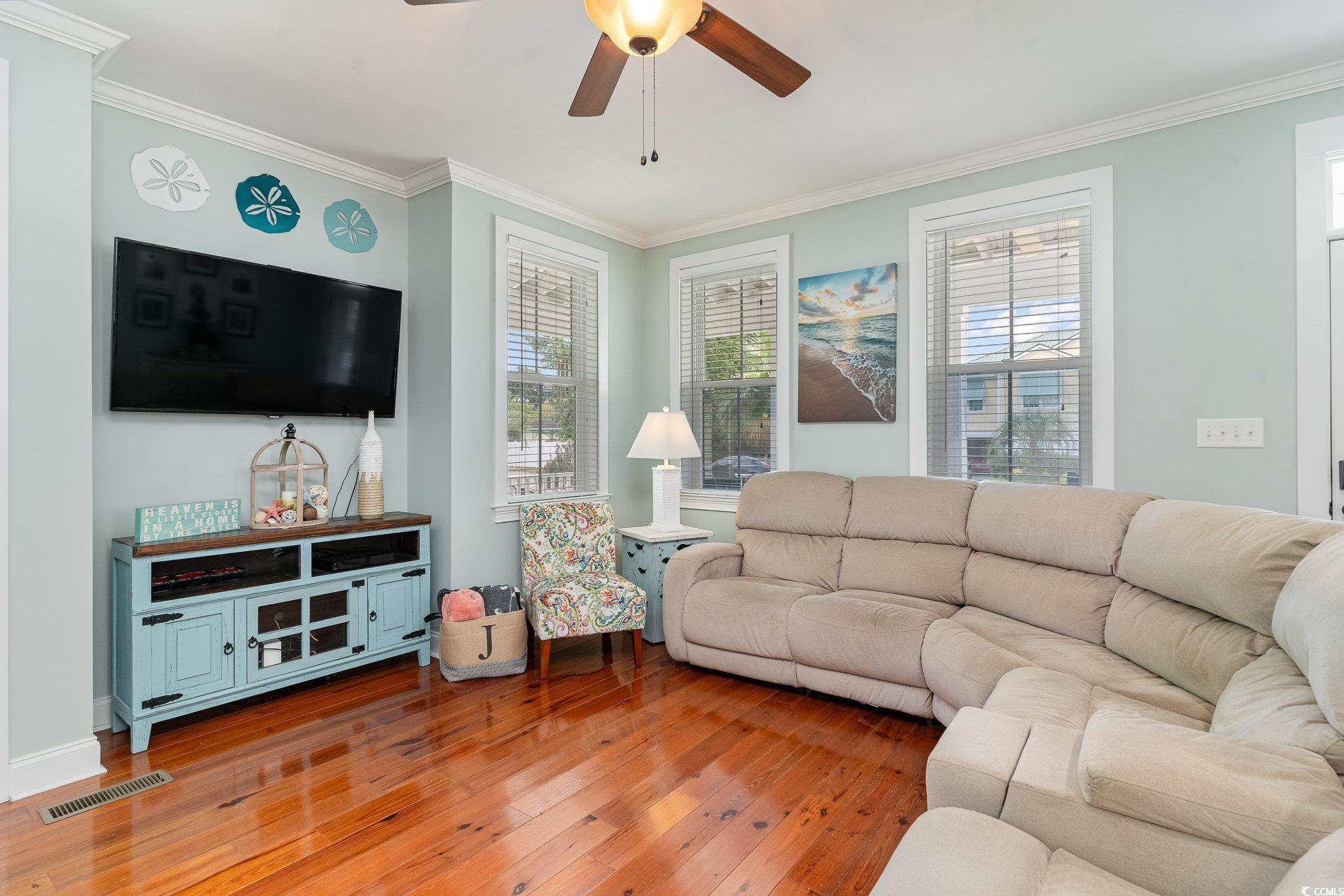116 Lake Pointe Drive Murrells Inlet, SC 29576 - Photo 8 of 36 Living room featuring crown molding, ceiling fan,