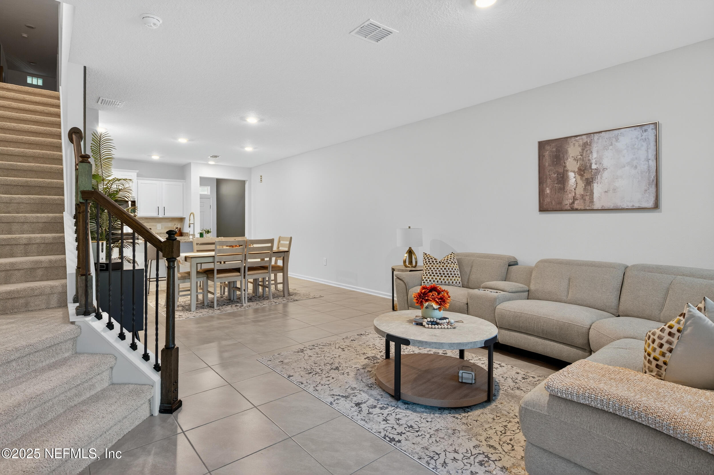 33 Coastline Way St. Augustine, FL 32092 - Photo 11 of 35 a living room with furniture and kitchen view