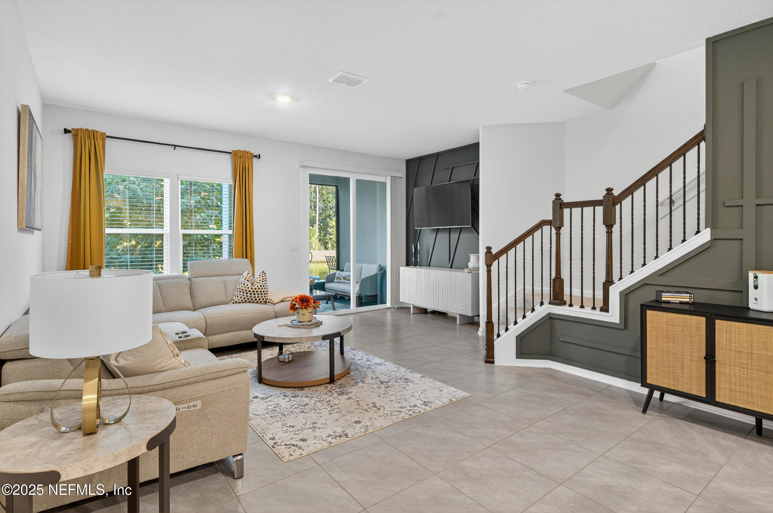33 Coastline Way St. Augustine, FL 32092 - Photo 13 of 35 a living room with furniture and a window
