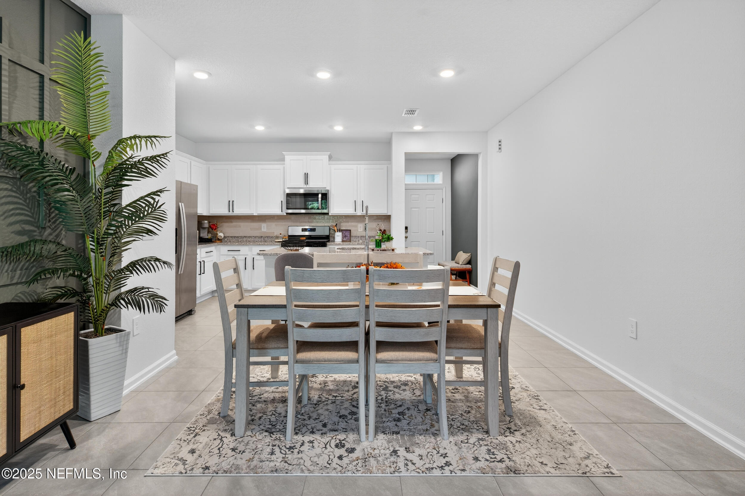 33 Coastline Way St. Augustine, FL 32092 - Photo 14 of 35 a view of a dining room with furniture