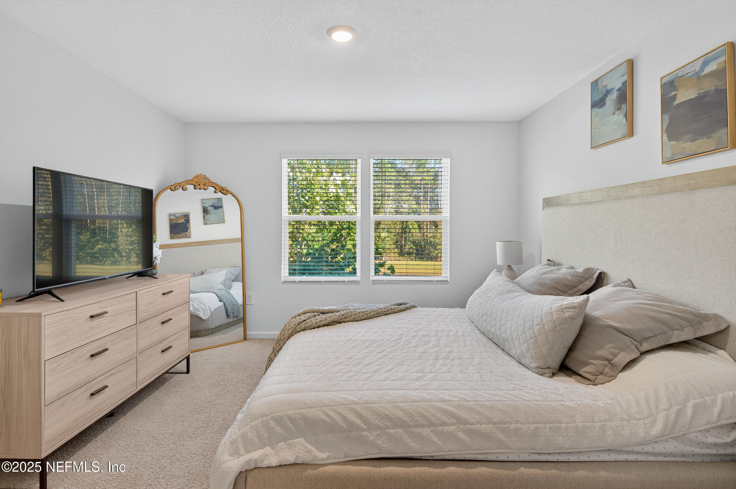 33 Coastline Way St. Augustine, FL 32092 - Photo 22 of 35 a large white bed in a white room