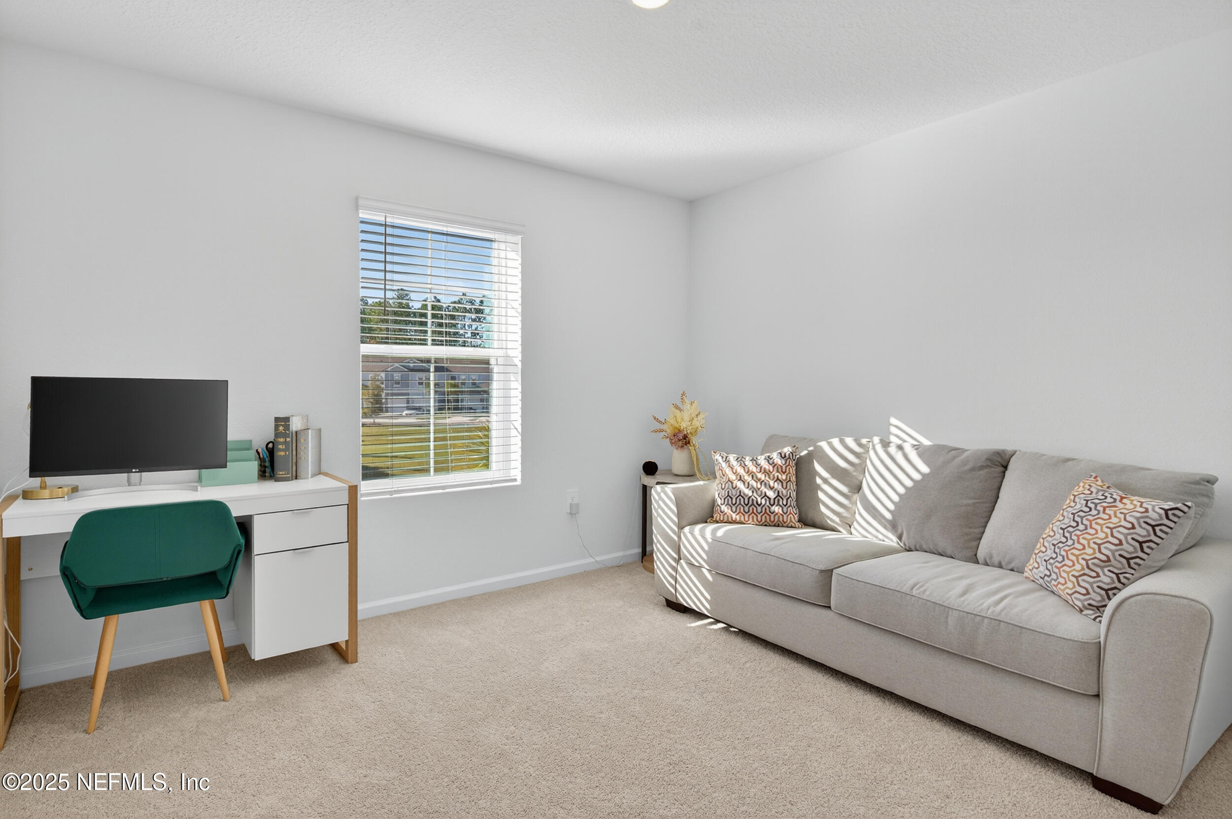 33 Coastline Way St. Augustine, FL 32092 - Photo 25 of 35 a living room with furniture and a window
