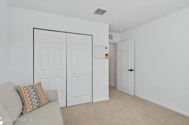 a bathroom with a sink a mirror a toilet and a bathtub