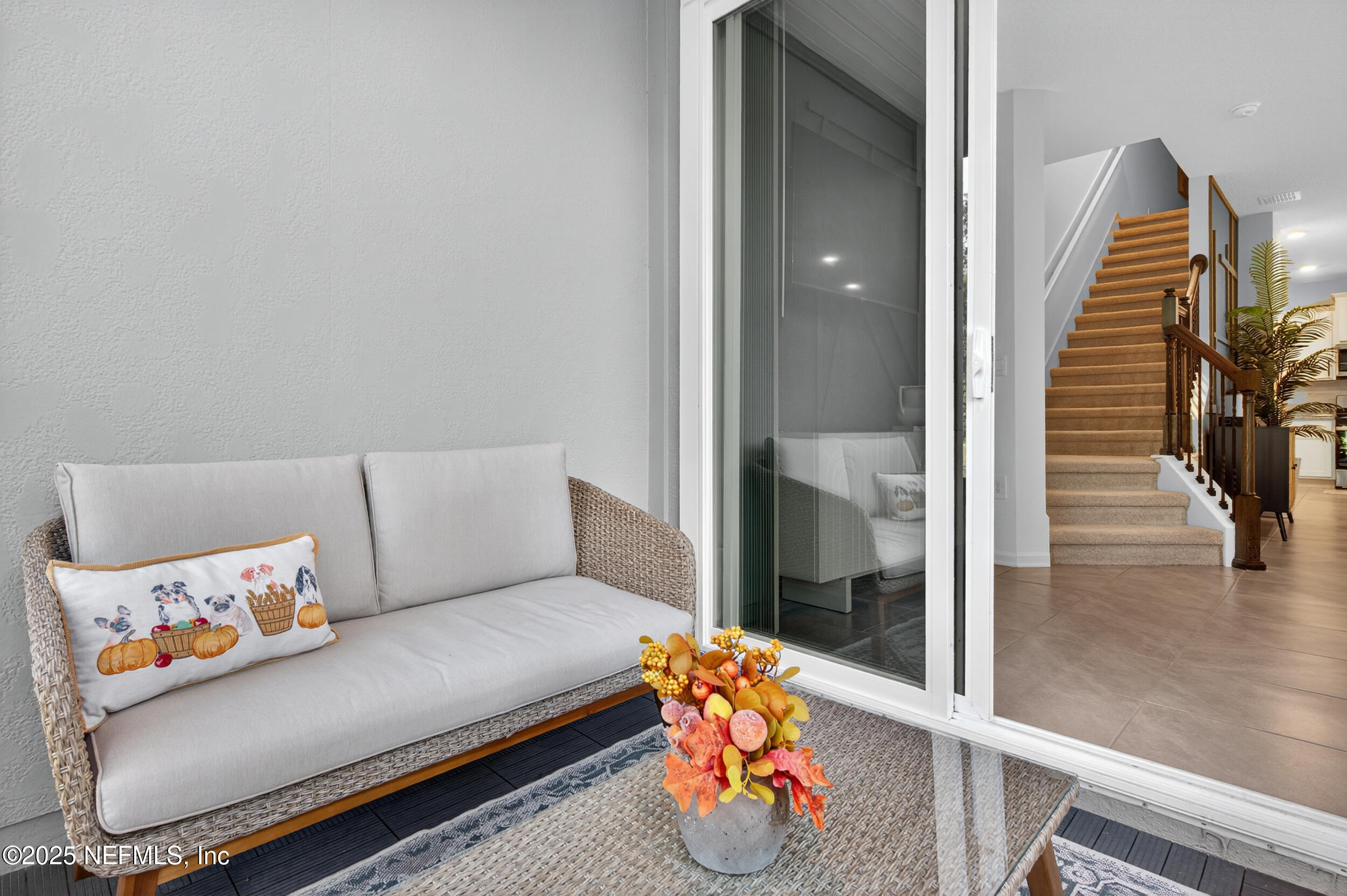 33 Coastline Way St. Augustine, FL 32092 - Photo 33 of 35 a living room with furniture and wooden floor