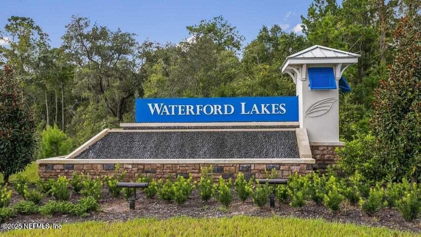 33 Coastline Way St. Augustine, FL 32092 - Photo 35 of 35 a sign that is sitting on a brick wall