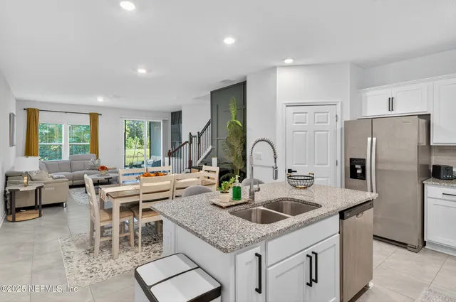 a view of a kitchen area with furniture and window