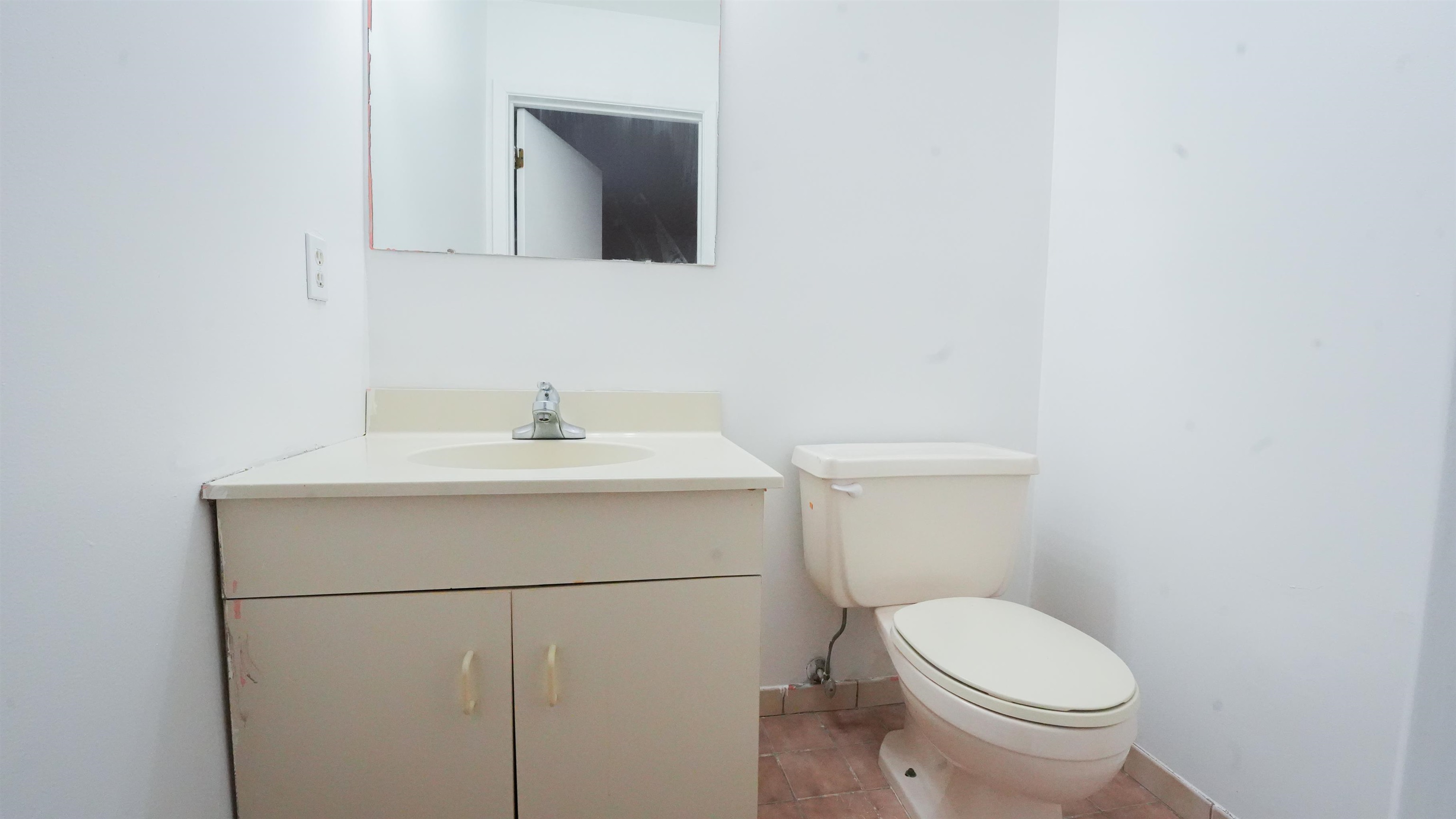 24 Riverview Court, Unit 24 Secaucus, NJ 07094 - Photo 13 of 25 a bathroom with a sink toilet and mirror