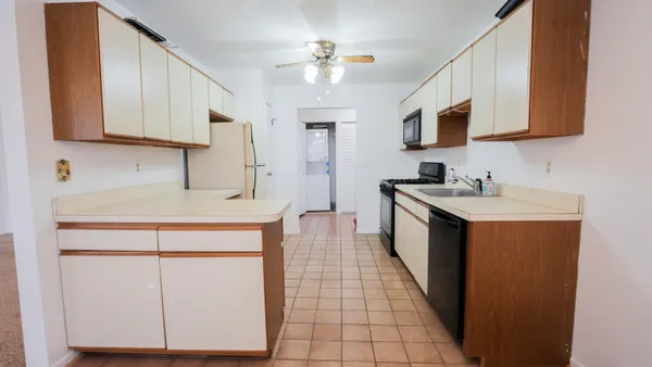 a view of bathroom with washer and dryer