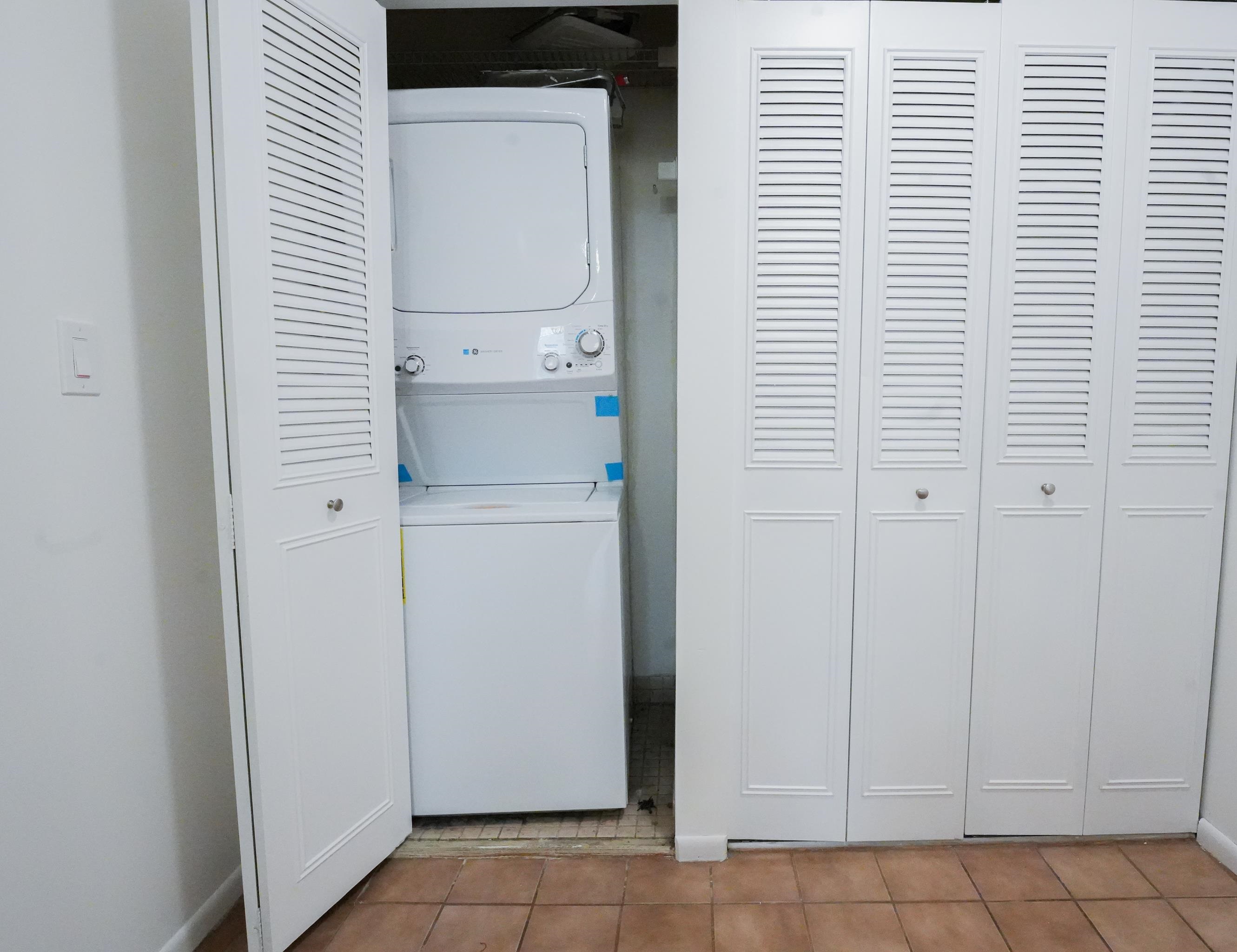 24 Riverview Court, Unit 24 Secaucus, NJ 07094 - Photo 7 of 25 a view of bathroom with washer and dryer