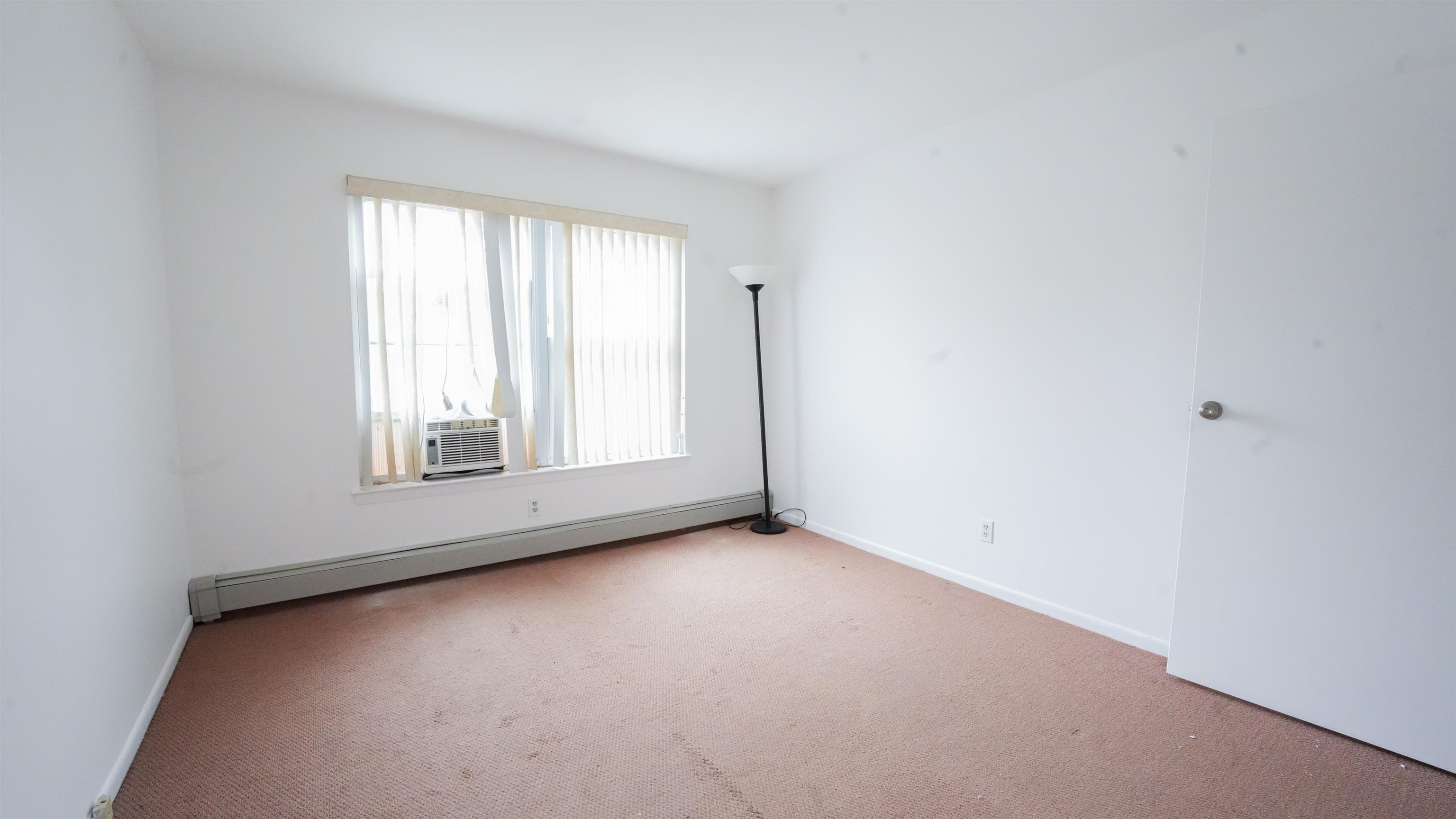 24 Riverview Court, Unit 24 Secaucus, NJ 07094 - Photo 10 of 25 an empty room with windows