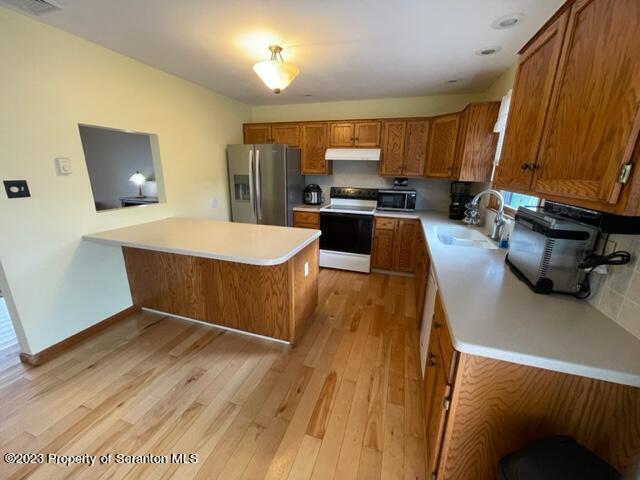 108 Baker Hirkey Road Tunkhannock, PA 18657 - Photo 21 of 66 a kitchen with a sink appliances and cabinets