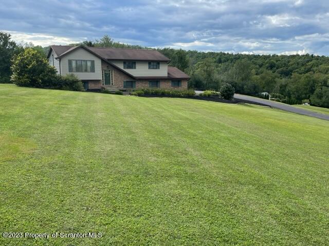 108 Baker Hirkey Road Tunkhannock, PA 18657 - Photo 4 of 66 a view of a house with a big yard