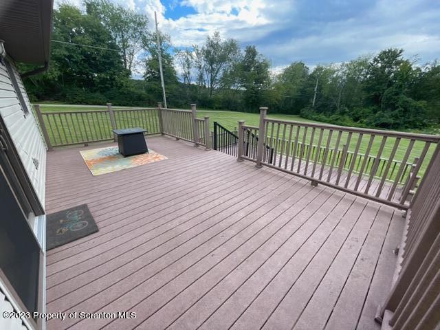 108 Baker Hirkey Road Tunkhannock, PA 18657 - Photo 54 of 66 a view of balcony with wooden floor and outdoor seating