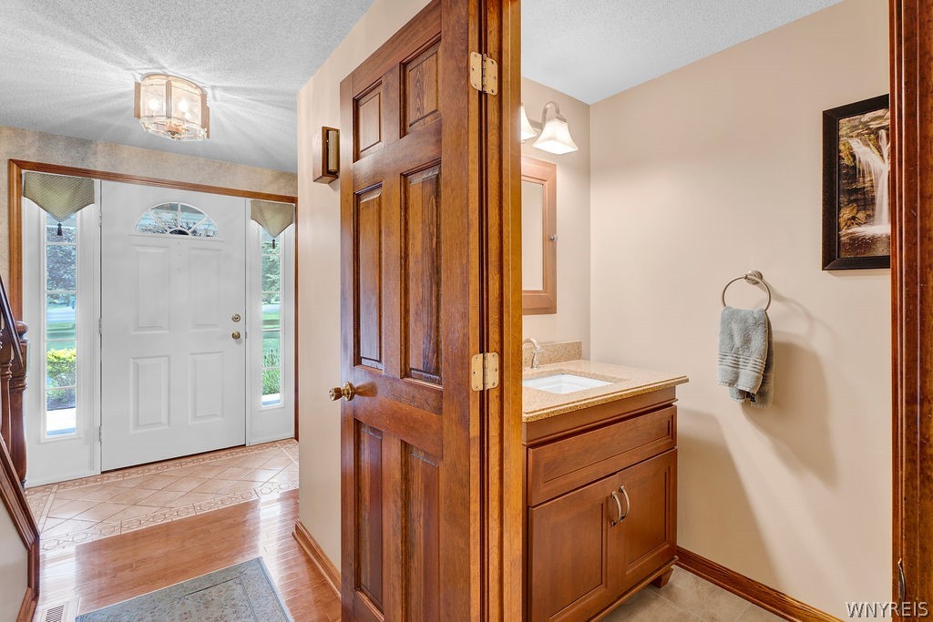 4815 Tonawanda Creek Road Pendleton, NY 14120 - Photo 12 of 49 First floor half bath