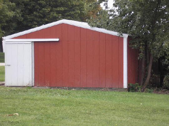 6198 Beede Road Carroll County, IL 61014 - Photo 3 of 6 a backyard of a house with lots of green space