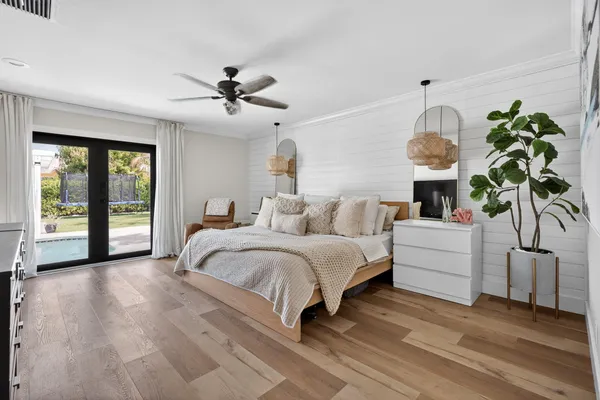 a swimming pool with outdoor seating yard and barbeque oven