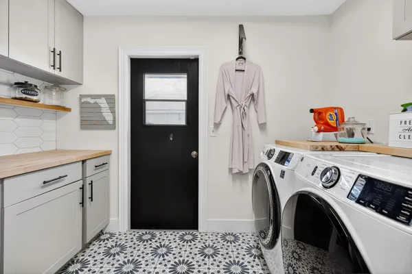 an aerial view of a house with a garden