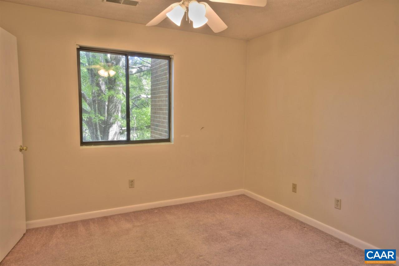 120 Turtle Creek Road, Unit 6 Charlottesville, VA 22901 - Photo 11 of 17 an empty room with a window