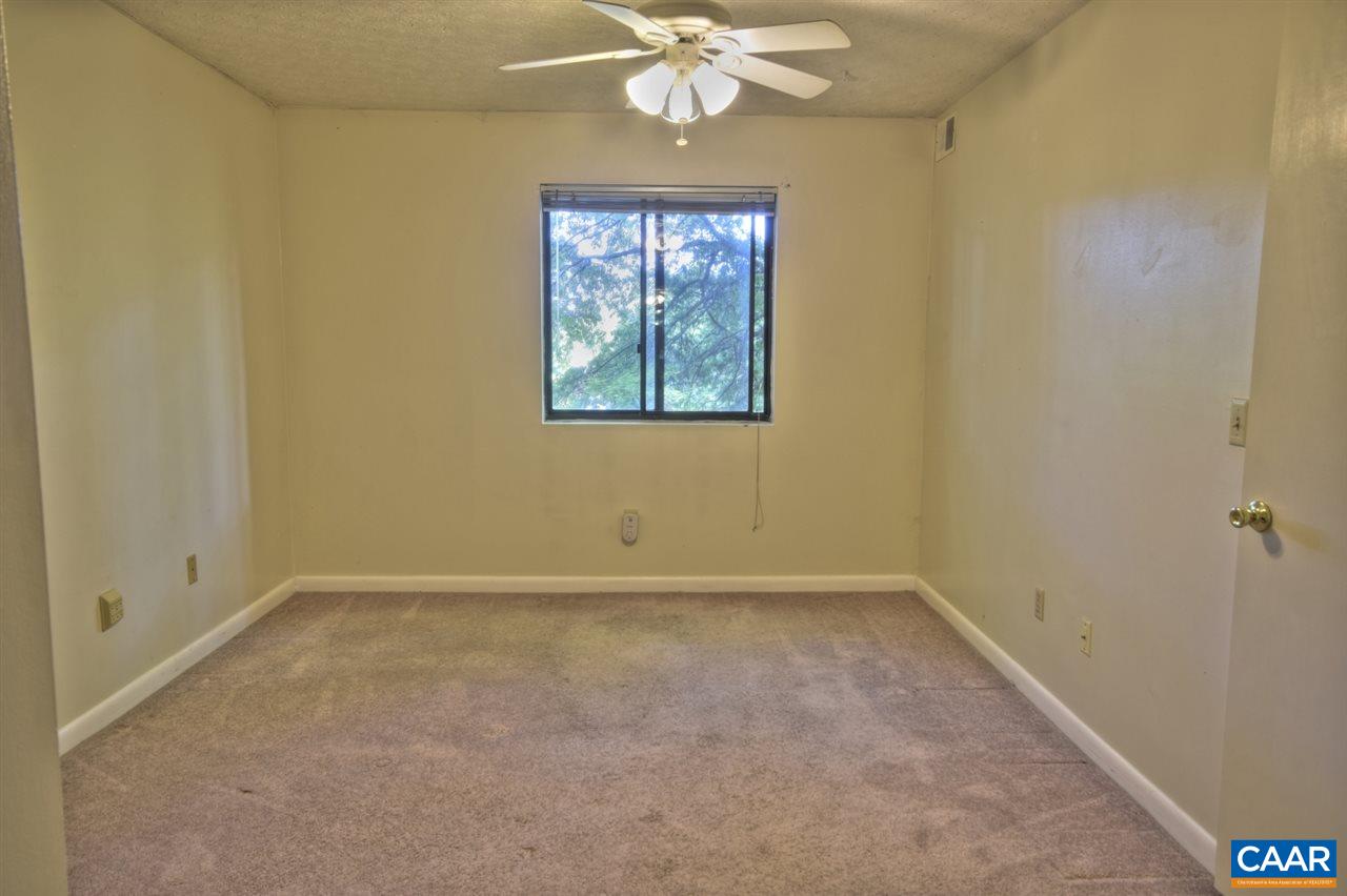 120 Turtle Creek Road, Unit 6 Charlottesville, VA 22901 - Photo 13 of 17 a view of an empty room with a window