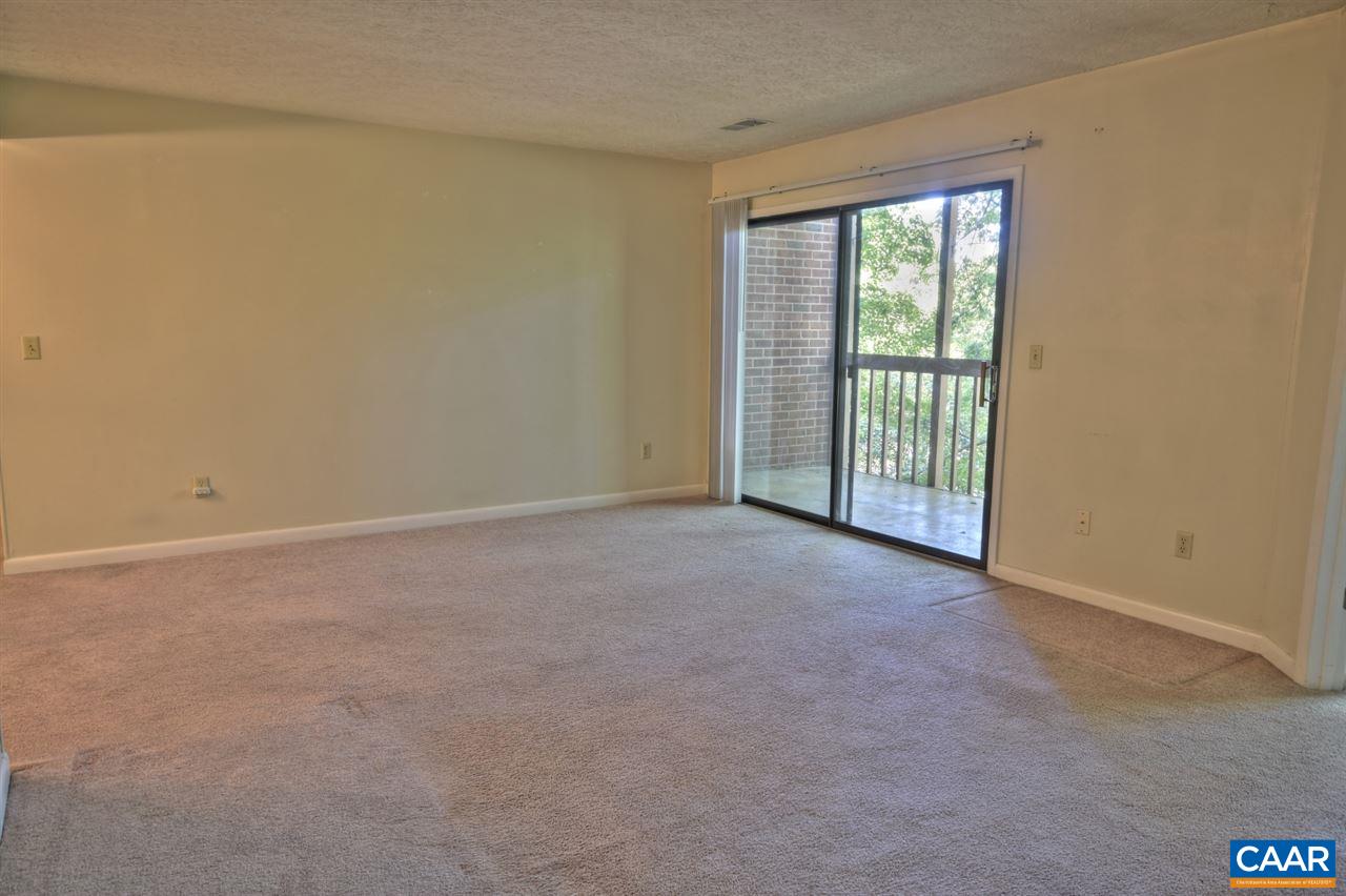 120 Turtle Creek Road, Unit 6 Charlottesville, VA 22901 - Photo 4 of 17 an empty room with windows