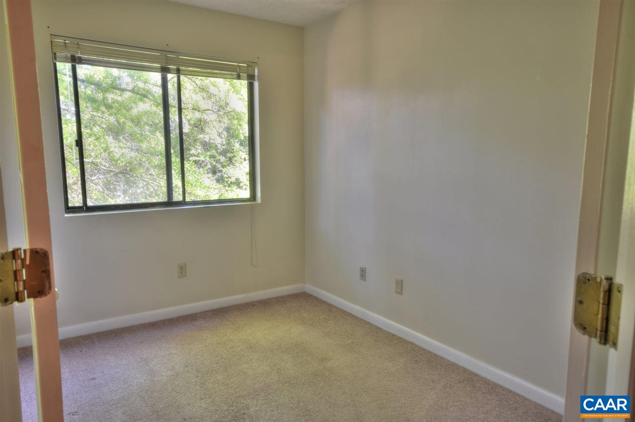 120 Turtle Creek Road, Unit 6 Charlottesville, VA 22901 - Photo 6 of 17 an empty room with a window
