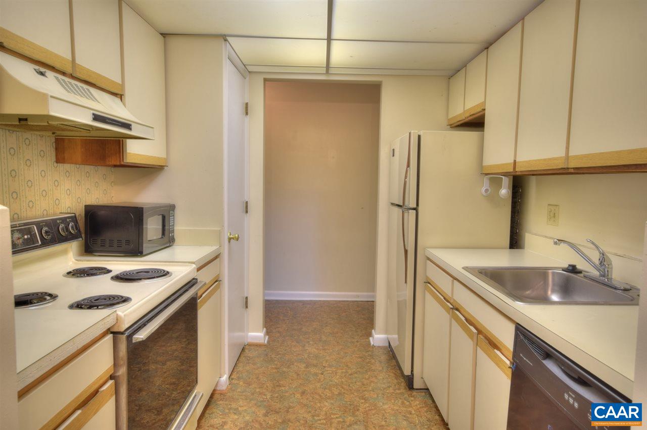 120 Turtle Creek Road, Unit 6 Charlottesville, VA 22901 - Photo 9 of 17 a kitchen that has a cabinets and a stove