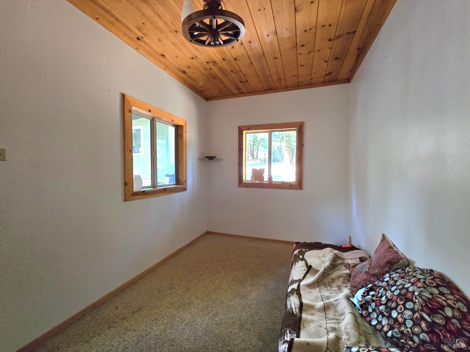 36193 Covelo Road Willits, CA 95490 - Photo 25 of 30 a bed sitting in a bedroom next to a window