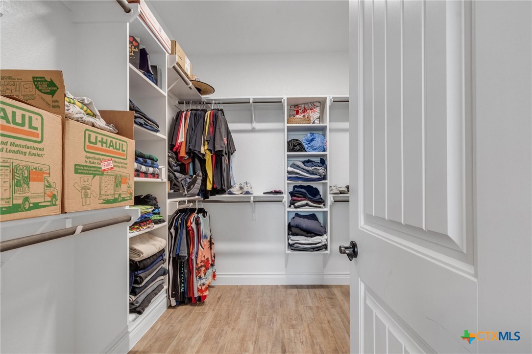 3919 Gracey Lane Kempner, TX 76539 - Photo 38 of 44 a view of walk in closet with clothes and shoes