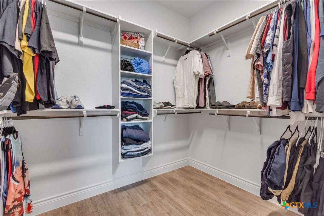 3919 Gracey Lane Kempner, TX 76539 - Photo 39 of 44 a view of walk in closet with clothes and shoes