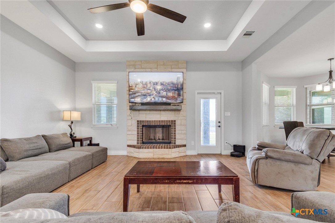 3919 Gracey Lane Kempner, TX 76539 - Photo 8 of 44 a living room with furniture and a fireplace