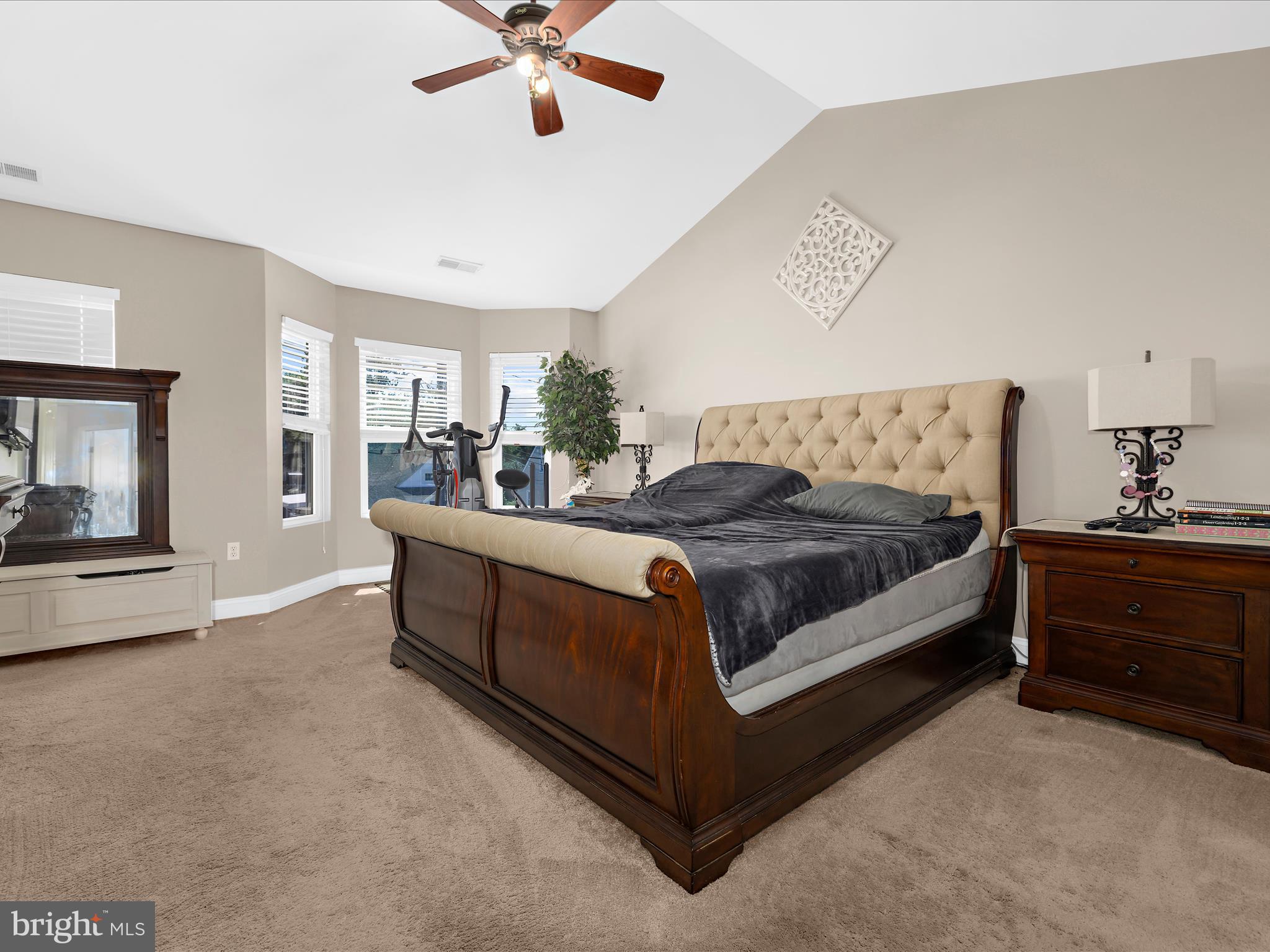 166 Meadow Road Pasadena, MD 21122 - Photo 18 of 47 a bedroom with a bed and a chandelier