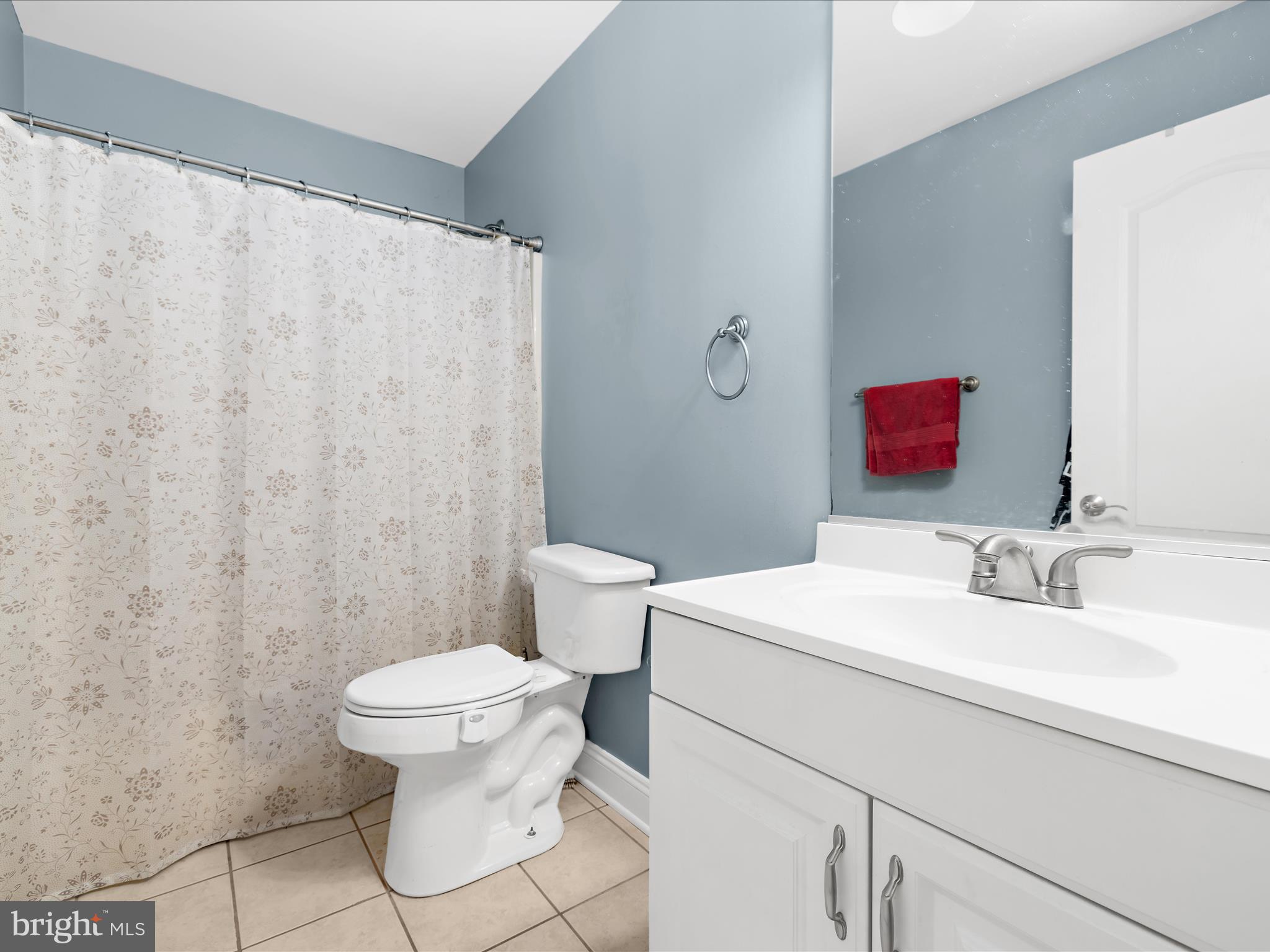 166 Meadow Road Pasadena, MD 21122 - Photo 25 of 47 a bathroom with a sink a toilet and a mirror