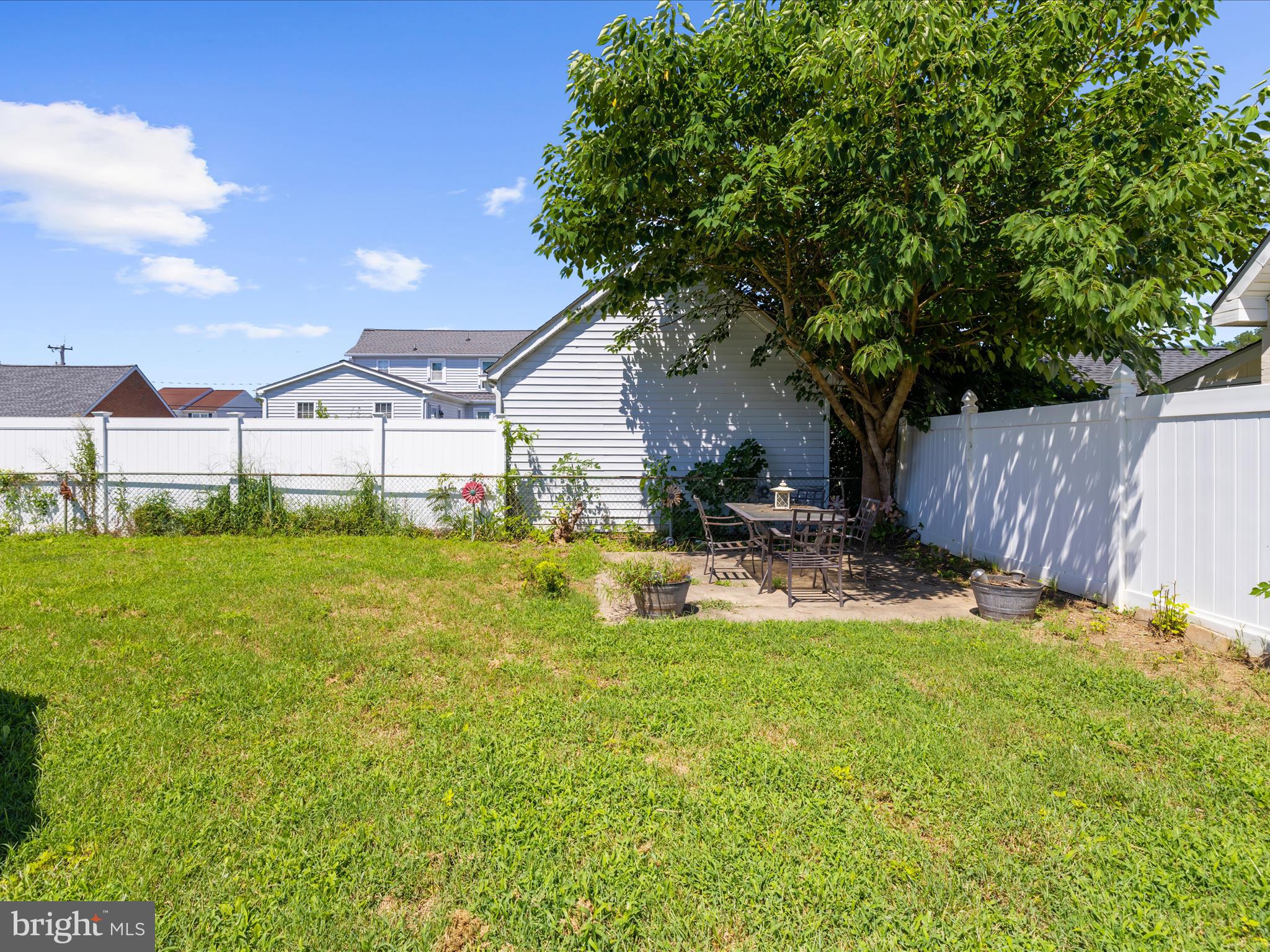 166 Meadow Road Pasadena, MD 21122 - Photo 28 of 47 a view of a house with a yard patio and a slide