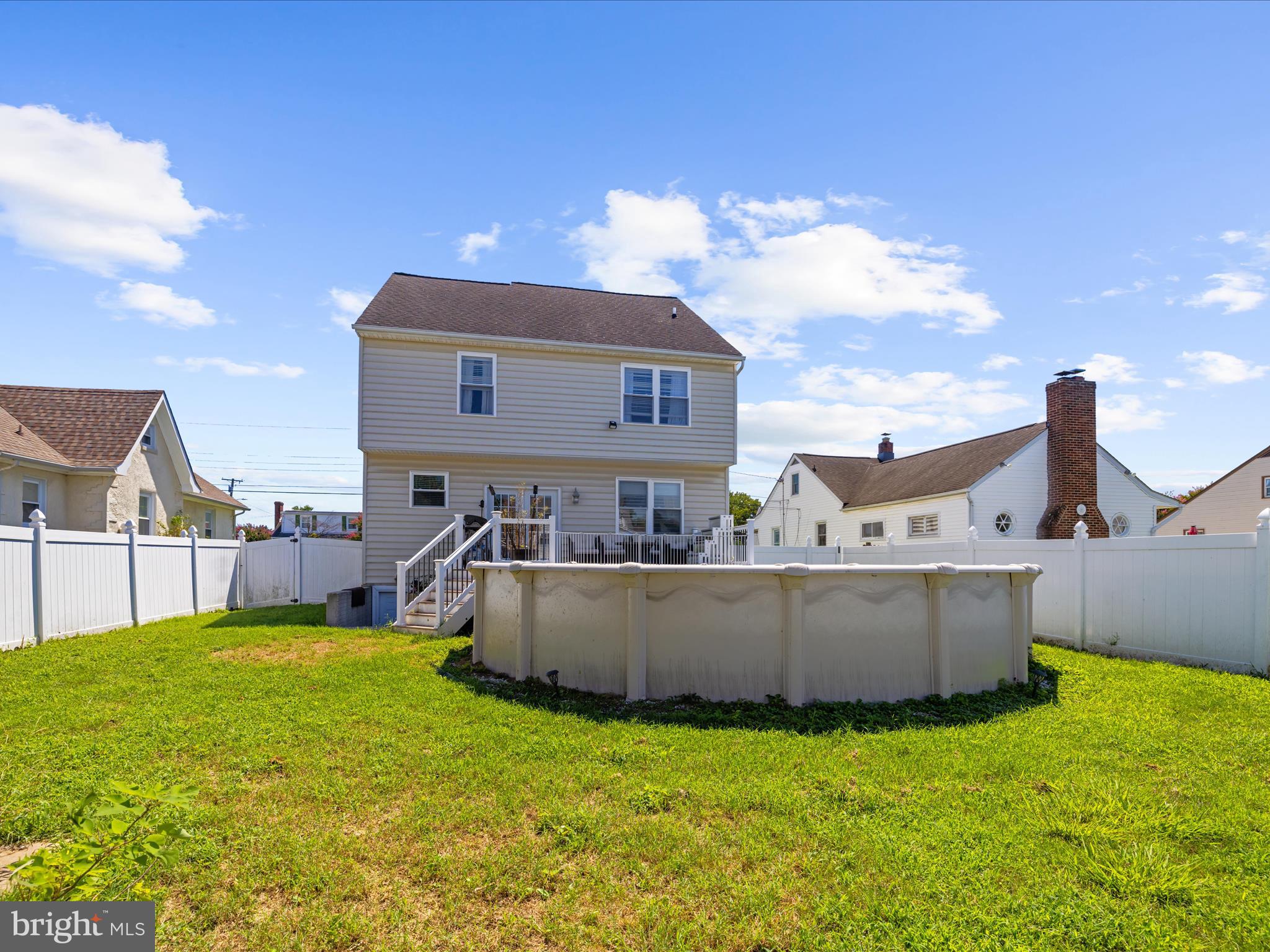 166 Meadow Road Pasadena, MD 21122 - Photo 29 of 47 a view of a house with a yard