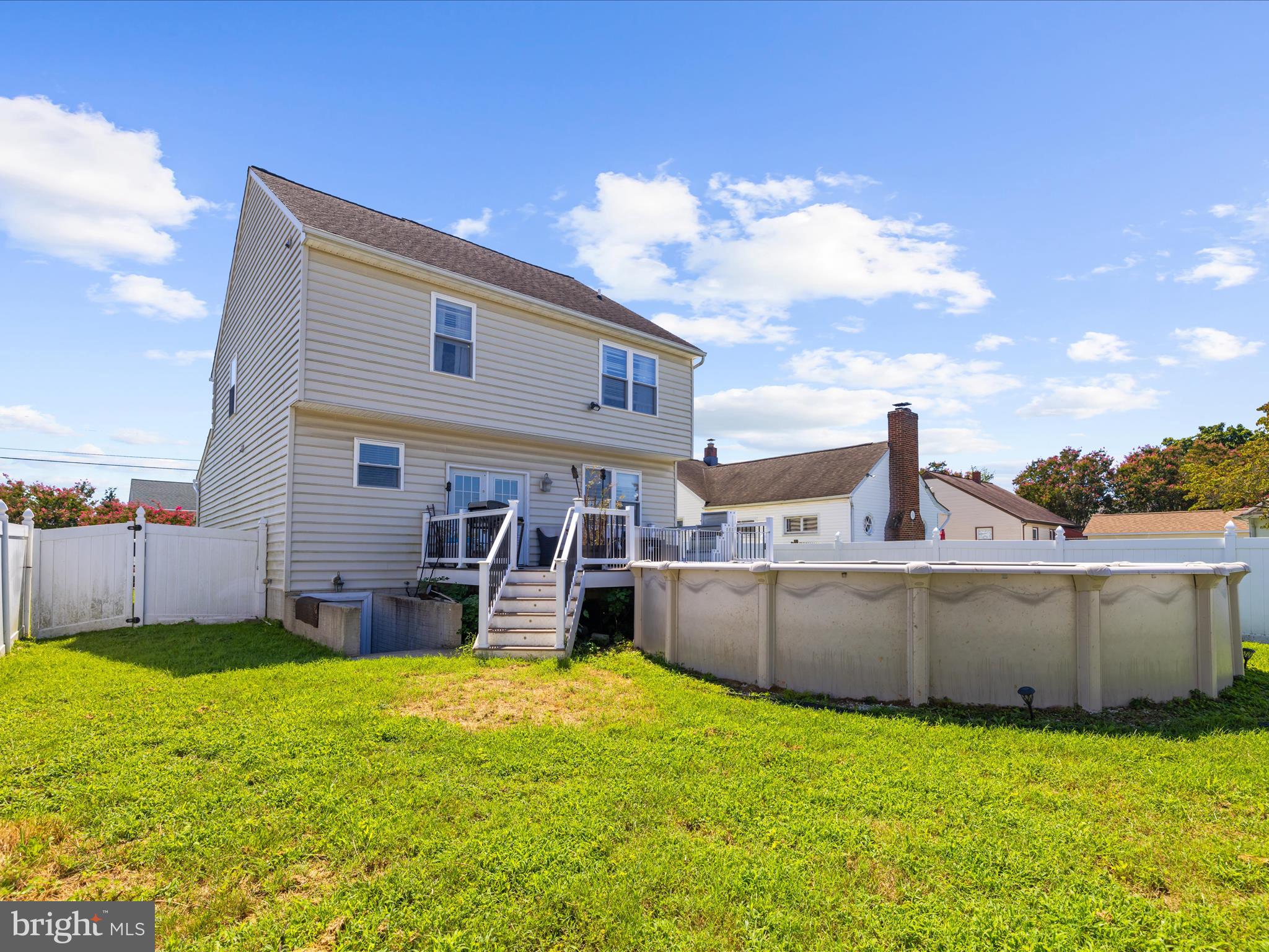 166 Meadow Road Pasadena, MD 21122 - Photo 31 of 47 a view of a house with a backyard