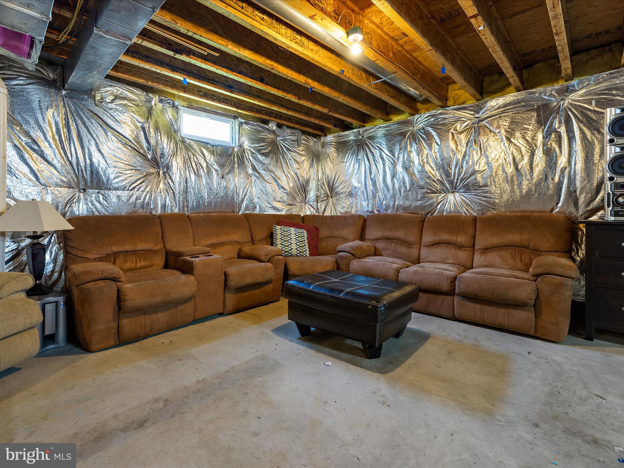 166 Meadow Road Pasadena, MD 21122 - Photo 35 of 47 a couch sitting in a living room next to a couch