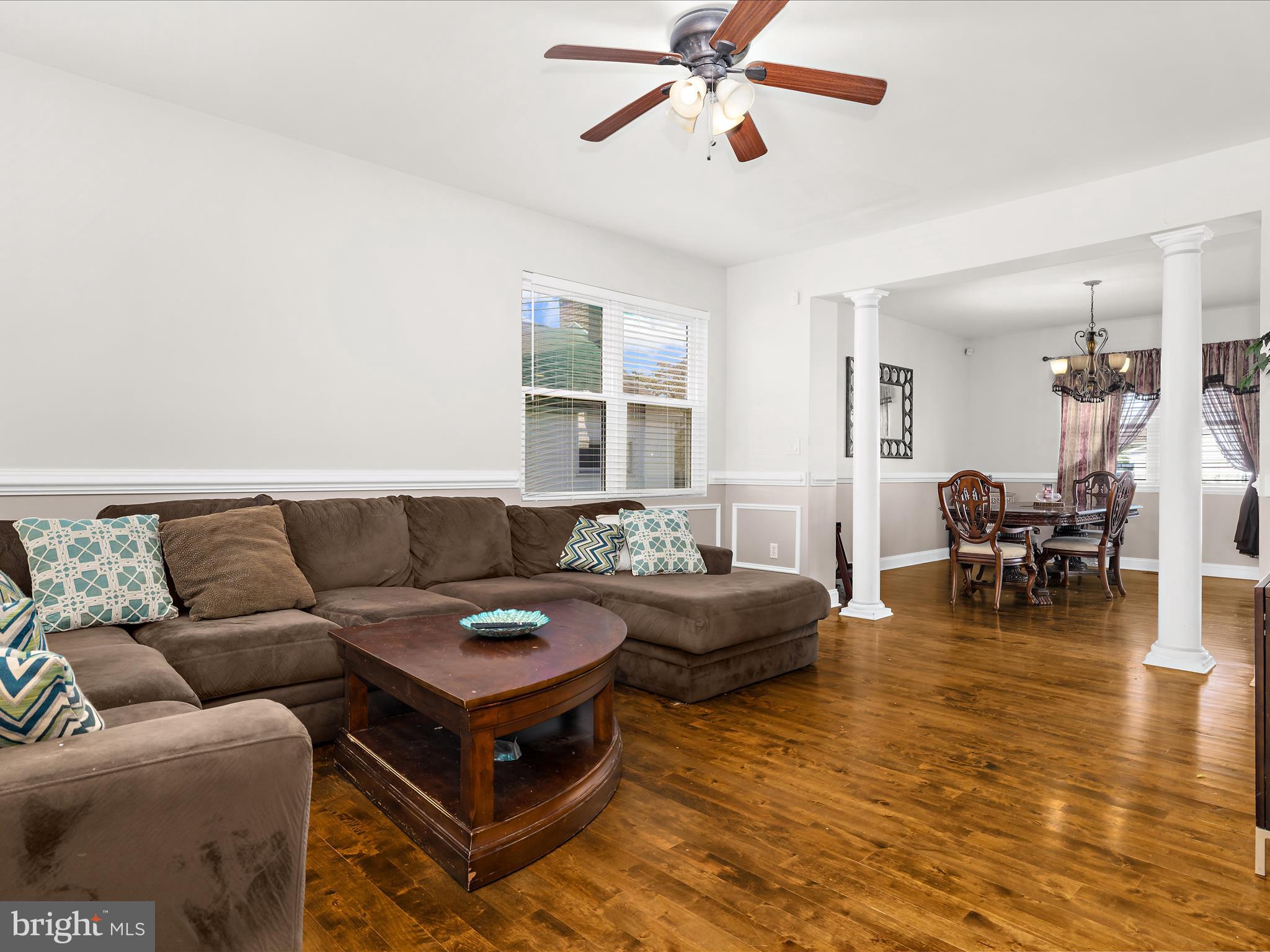 166 Meadow Road Pasadena, MD 21122 - Photo 5 of 47 a living room with furniture and a wooden floor